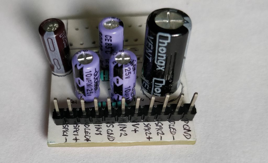 Header and capacitors soldered