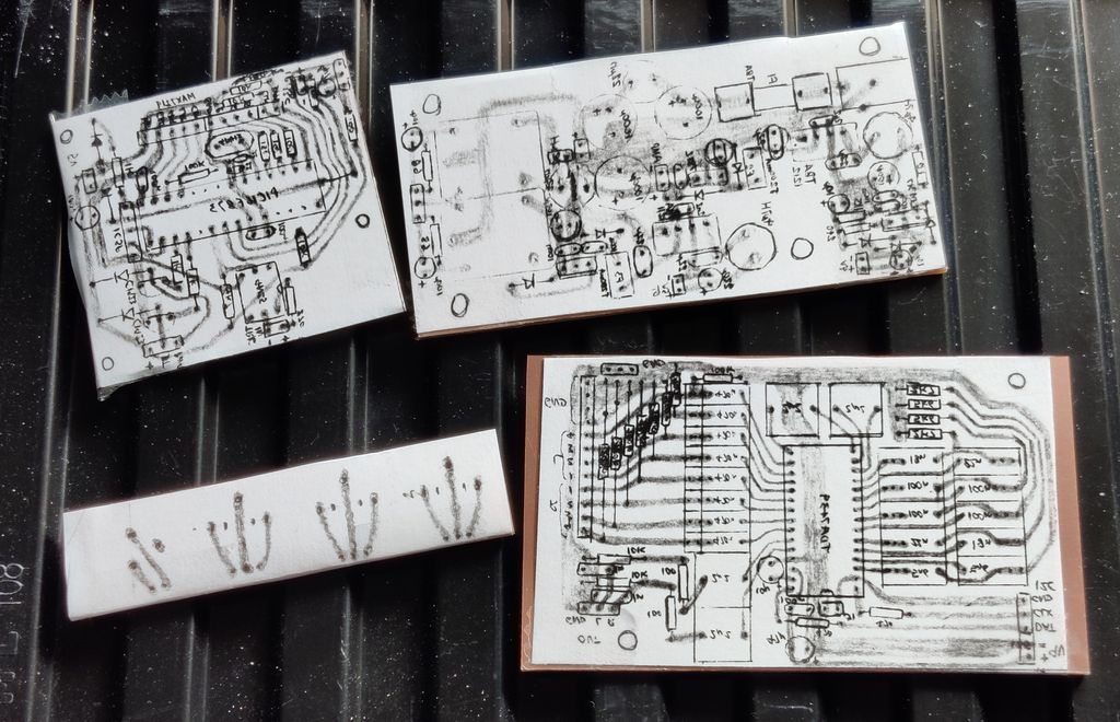 PCBs with reversed design print out prior to drilling