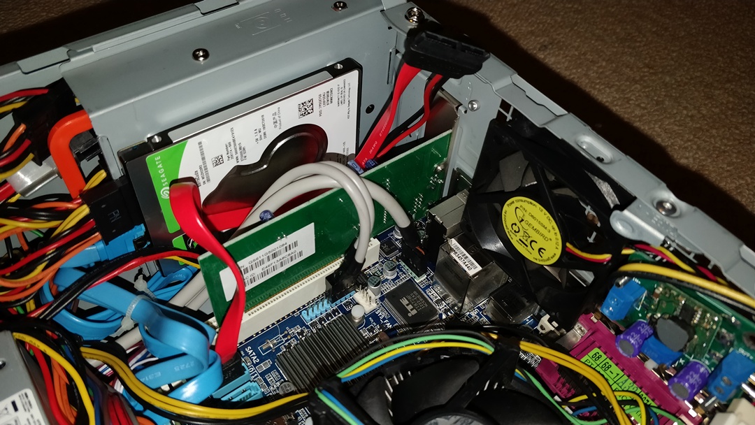 Picture of server inside, network card, disks