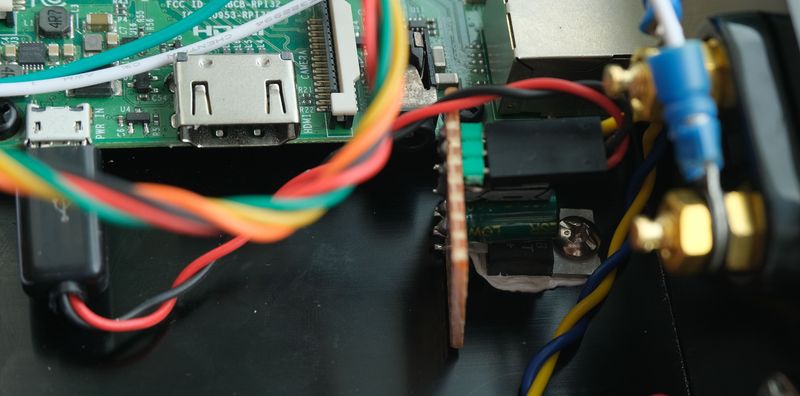 Picture of LM2940 PSU board, mounted to case for heatsinking